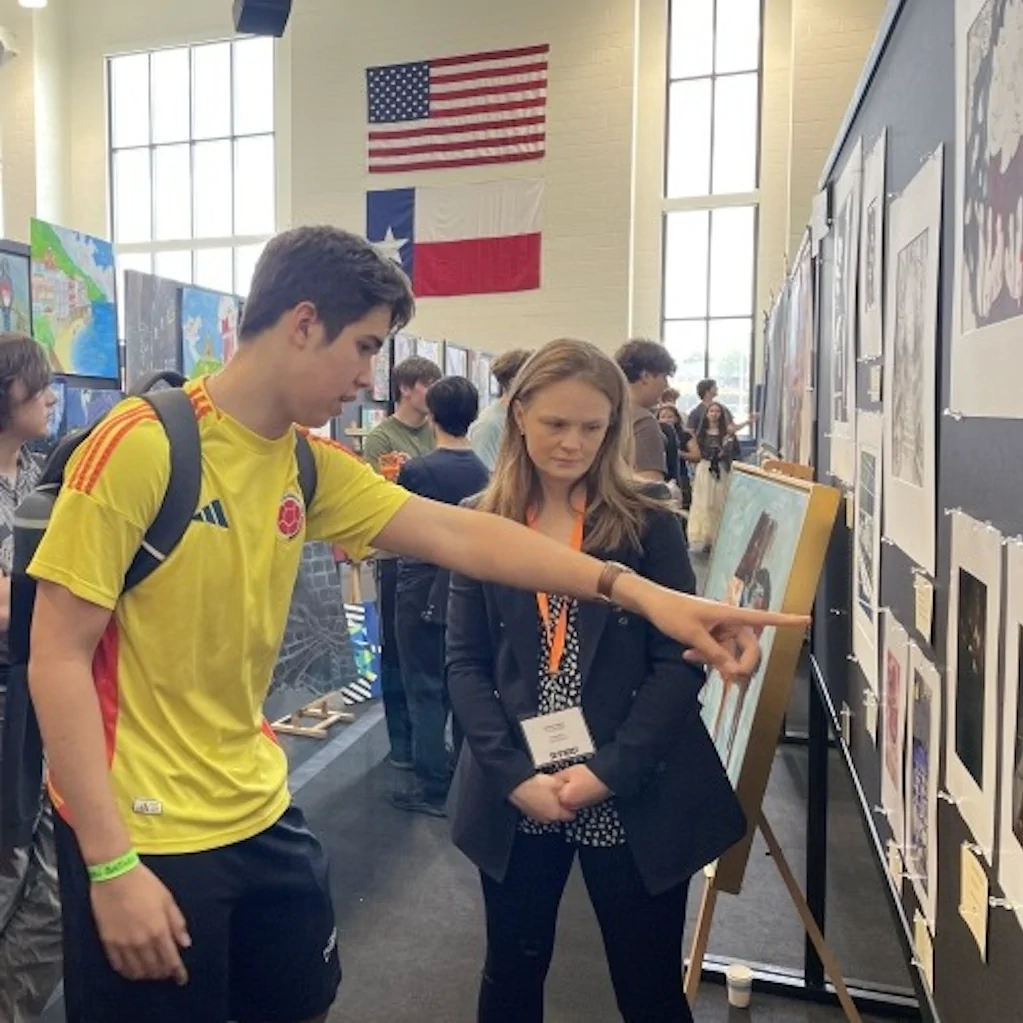 ISAS Arts Festival: Student Discussing Art Display