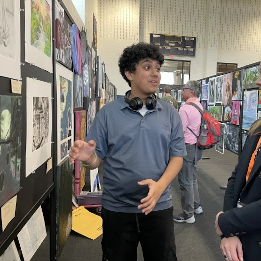 ISAS Arts Festival: Student with Artwork