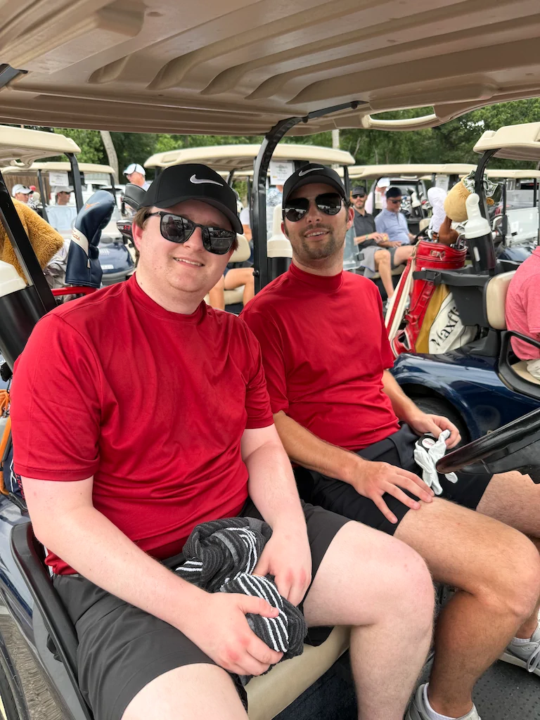 Two alumni enjoying the golf course during Reunion Weekend
