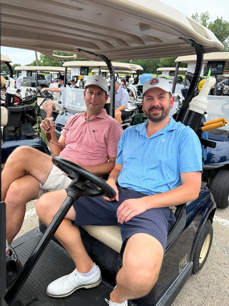 Two alumni on the golf course during Reunion Weekend