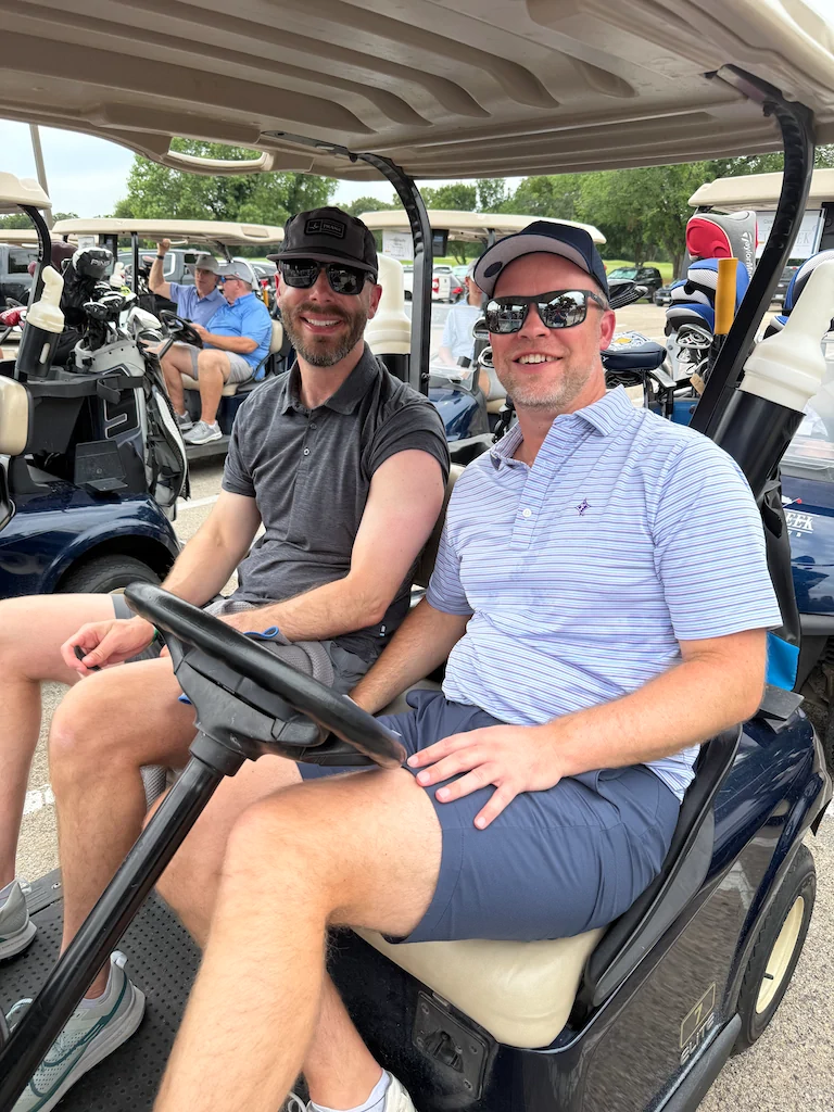 Golf cart participants during the Reunion Weekend outing