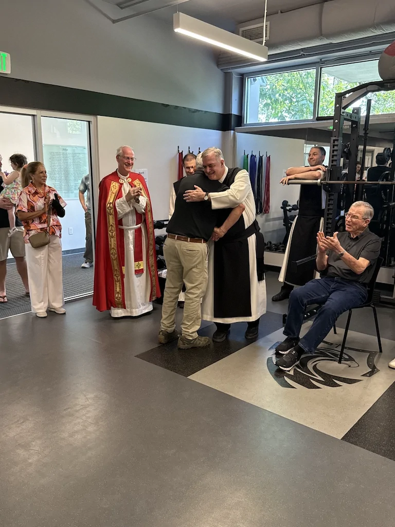 Monks and guests gathering during Reunion Weekend